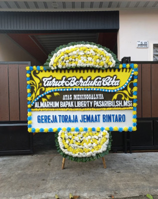 Papan Bunga Duka di Basarang